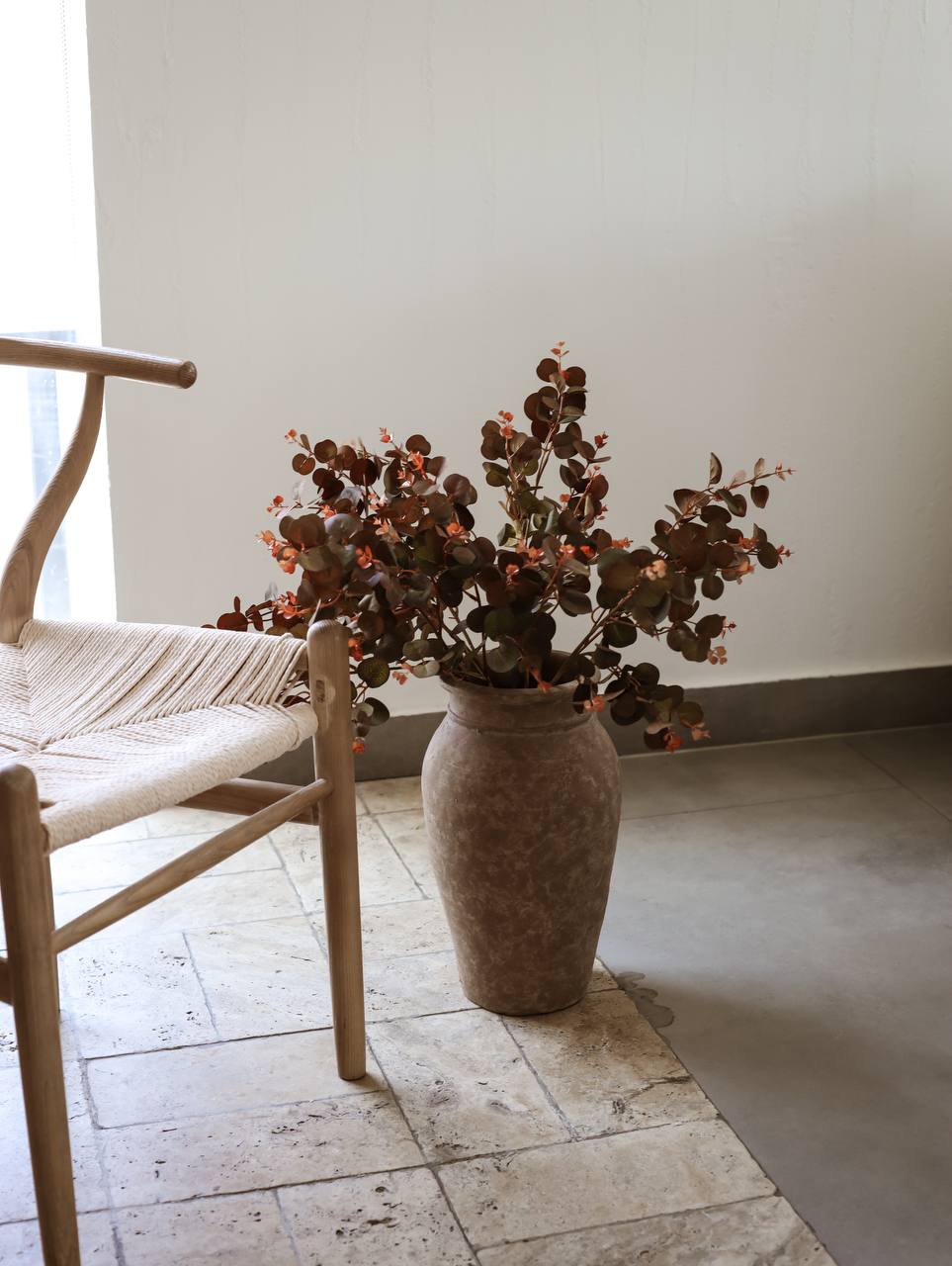 Artificial flower in rustic pot